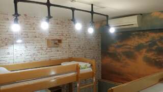 Хостелы Envoy Hostel & Tours Ереван Кровать в общем номере с 4 кроватями-9